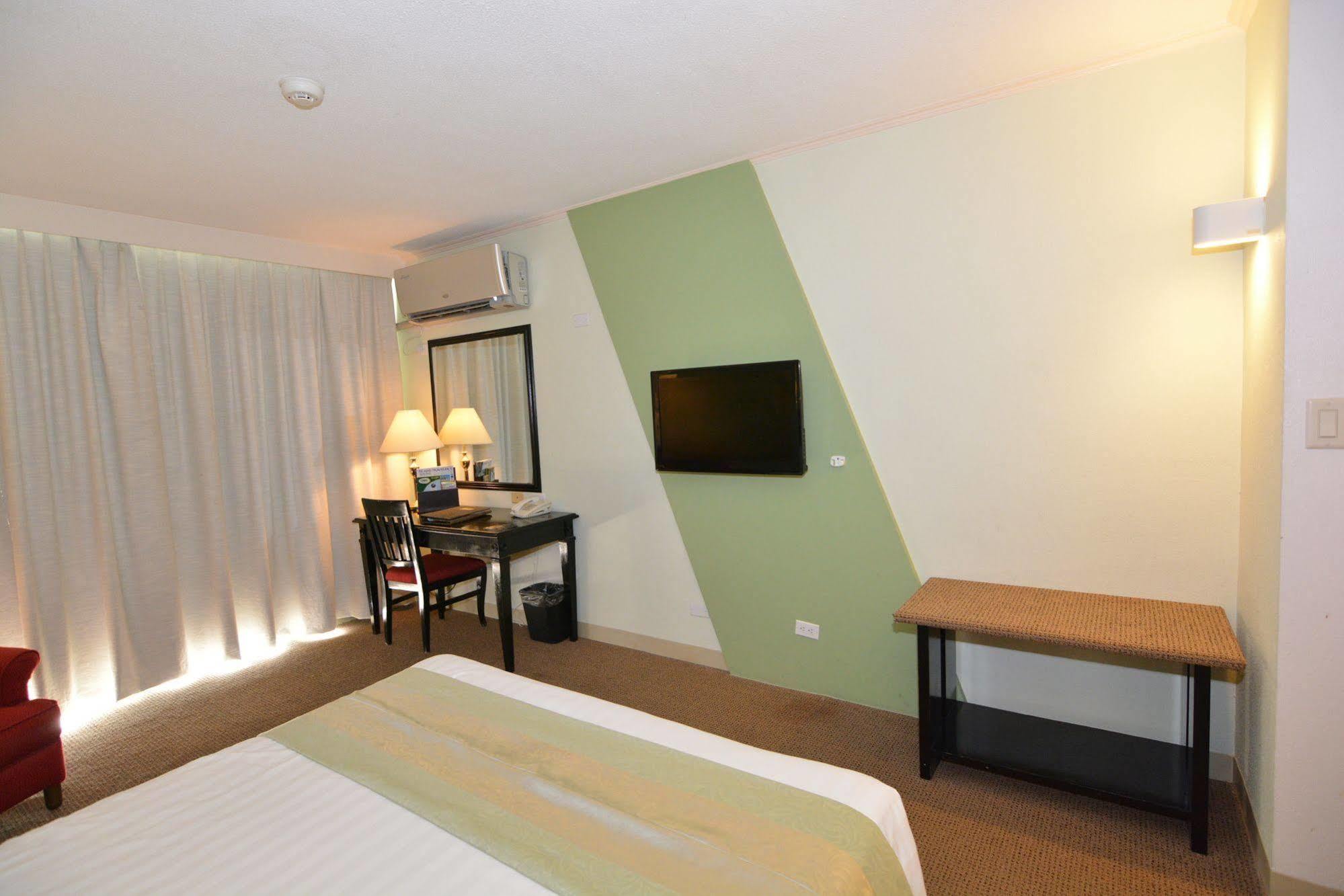 Century Hotel Garapan Exterior photo